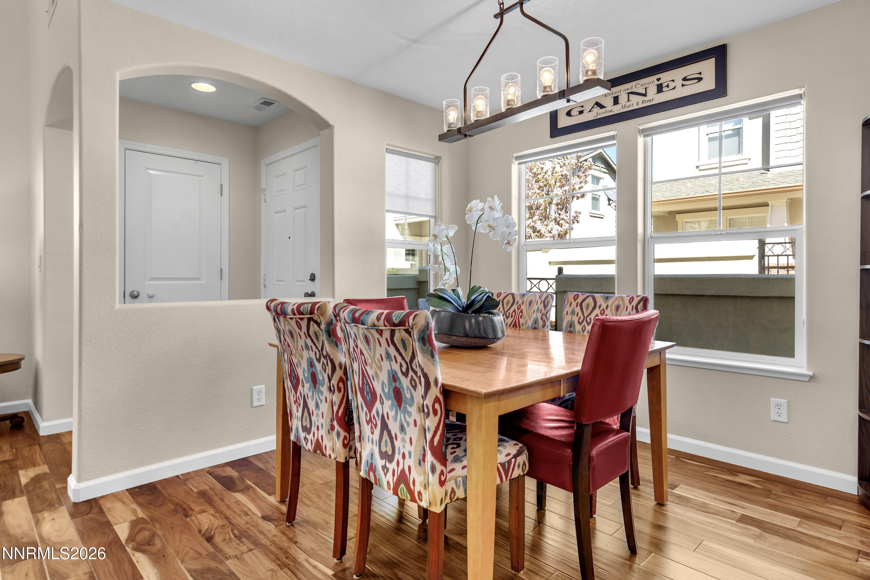 1642 Spring Hill Drive Reno, NV 89523 - Photo 11 of 43 a view of a dining room with furniture window and wooden floor