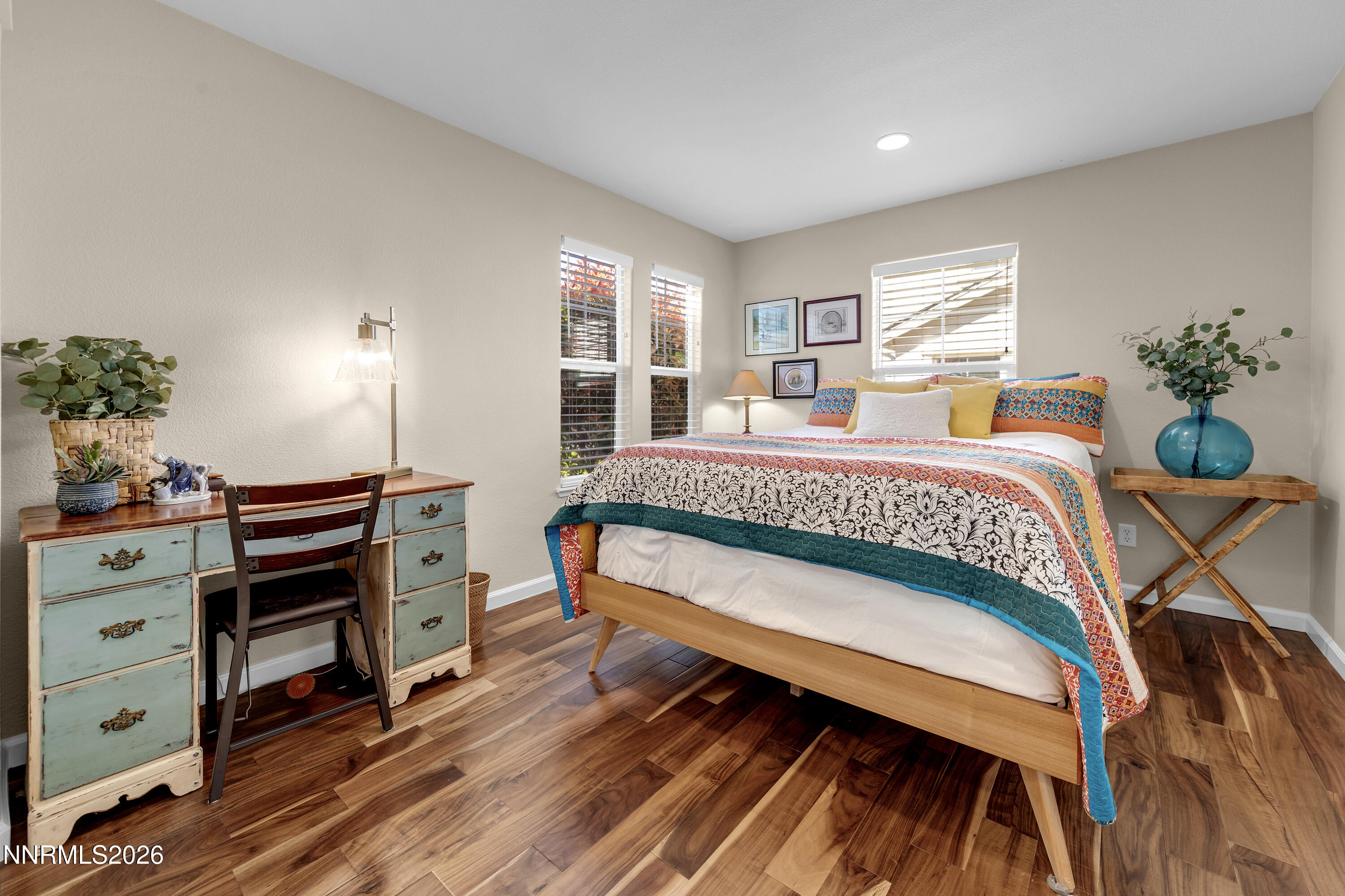 1642 Spring Hill Drive Reno, NV 89523 - Photo 15 of 43 a bedroom with a bed and a dresser