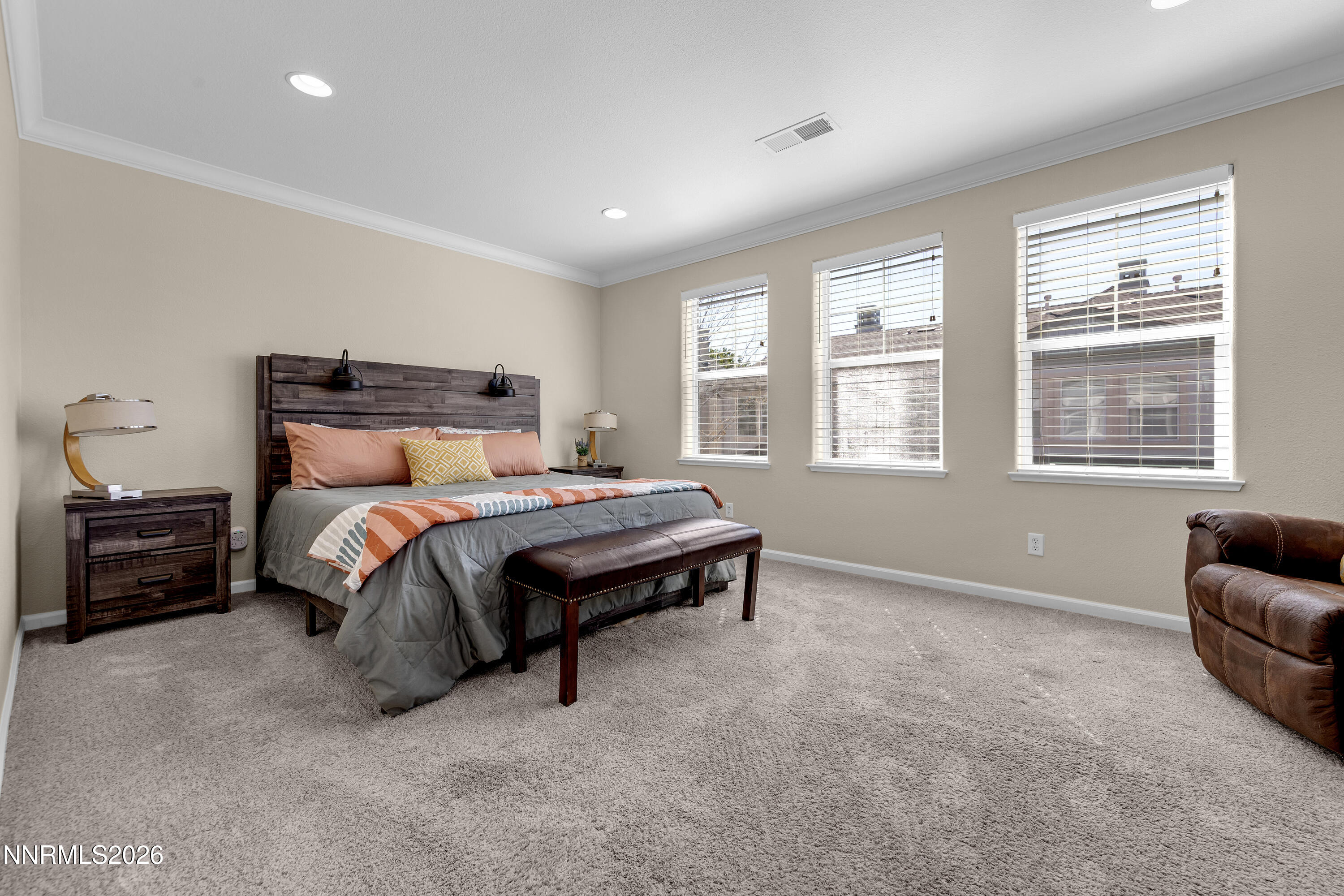 1642 Spring Hill Drive Reno, NV 89523 - Photo 17 of 43 a bedroom with a bed and a couch