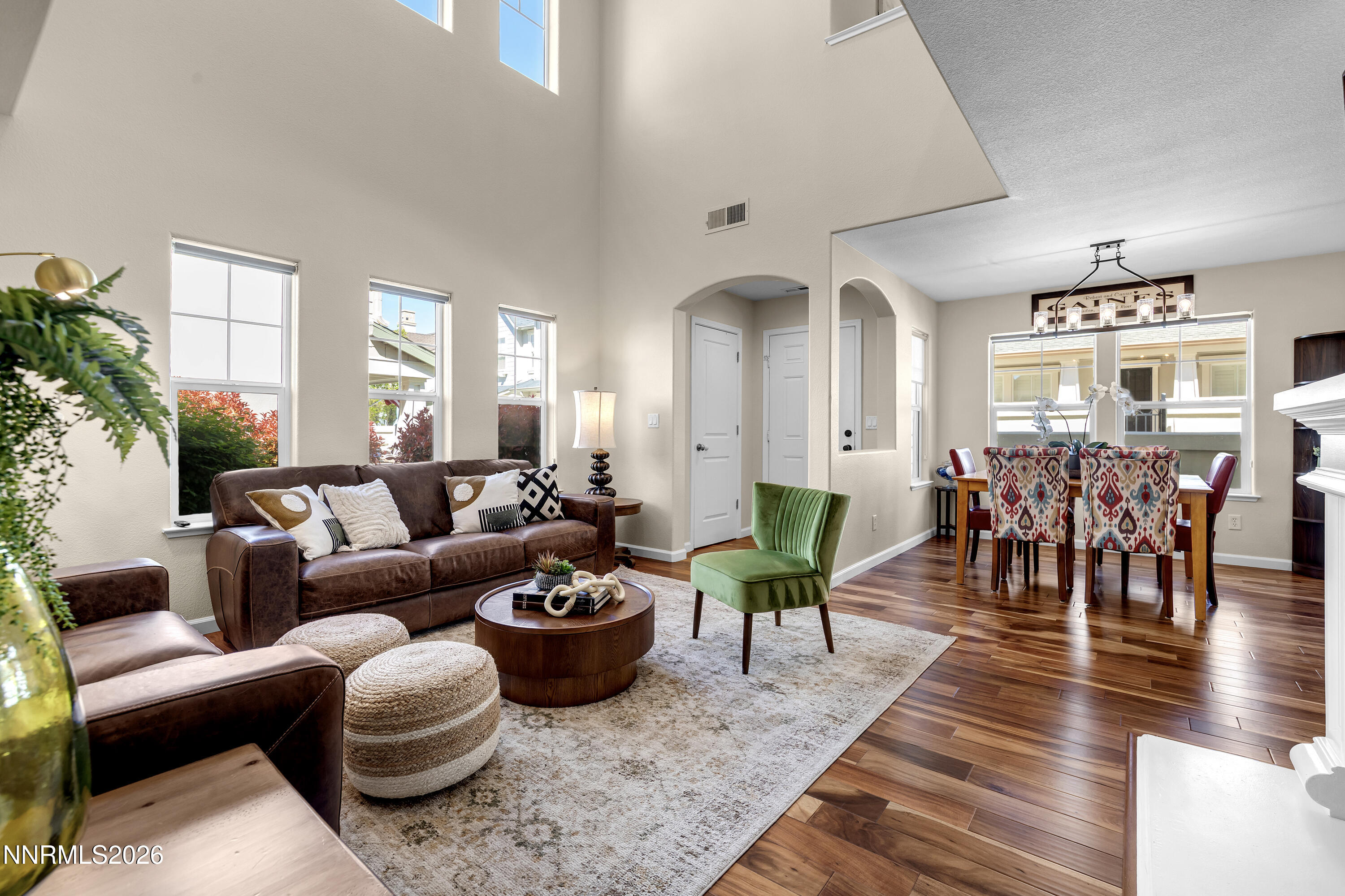 1642 Spring Hill Drive Reno, NV 89523 - Photo 2 of 43 a living room with furniture potted plant and open kitchen view