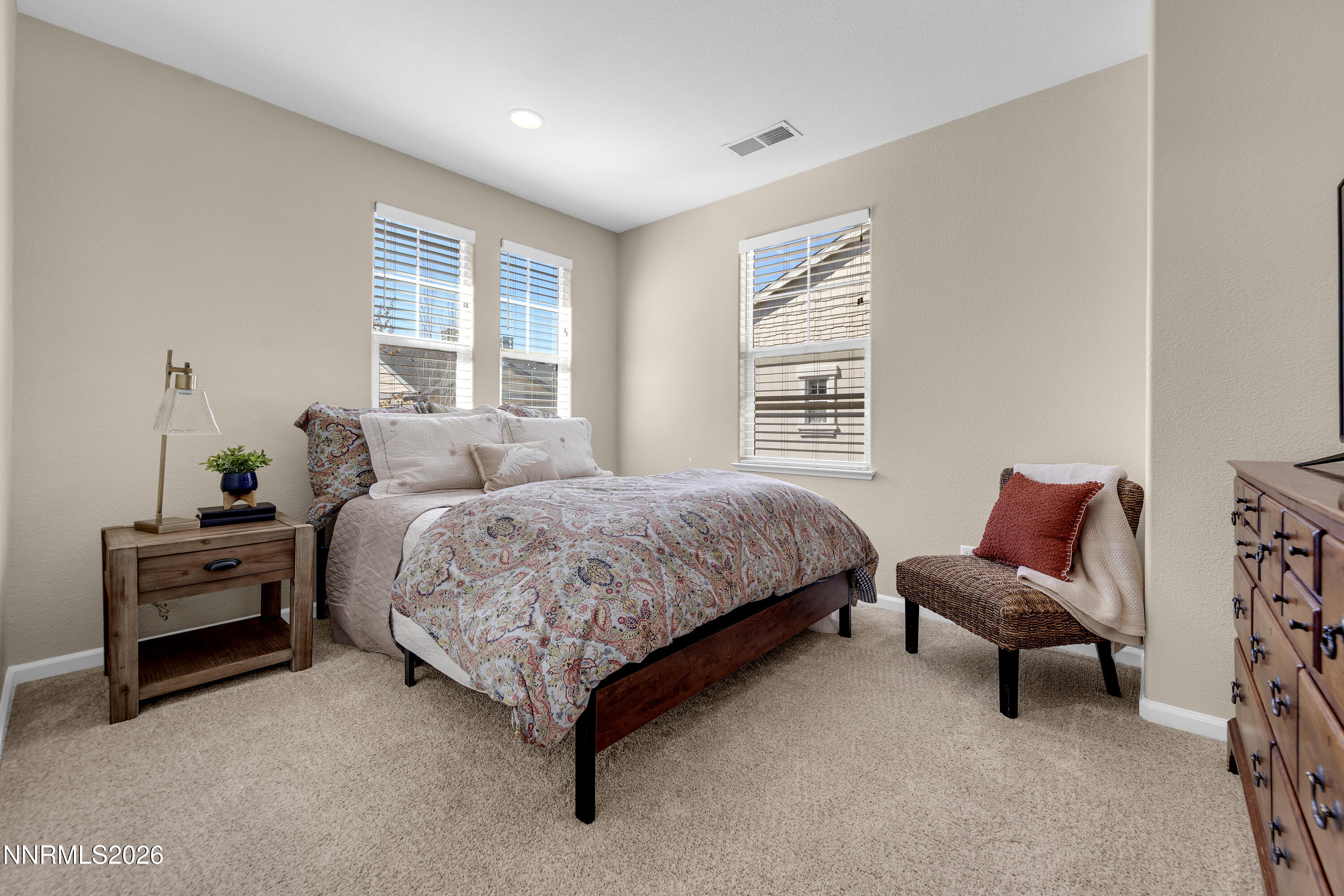 1642 Spring Hill Drive Reno, NV 89523 - Photo 24 of 43 a bedroom with a bed chair and window