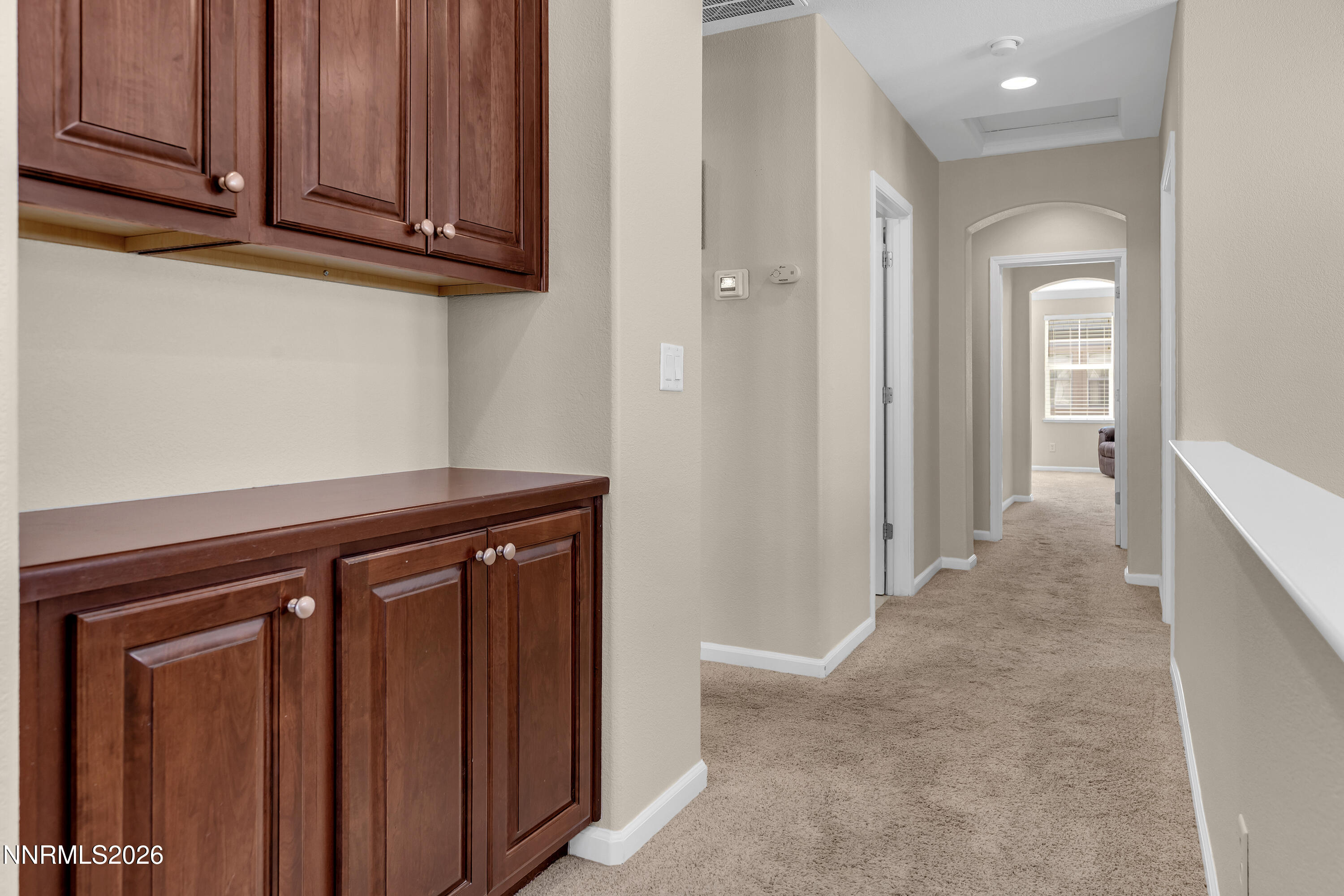 1642 Spring Hill Drive Reno, NV 89523 - Photo 27 of 43 a view of a hallway with washer and dryer
