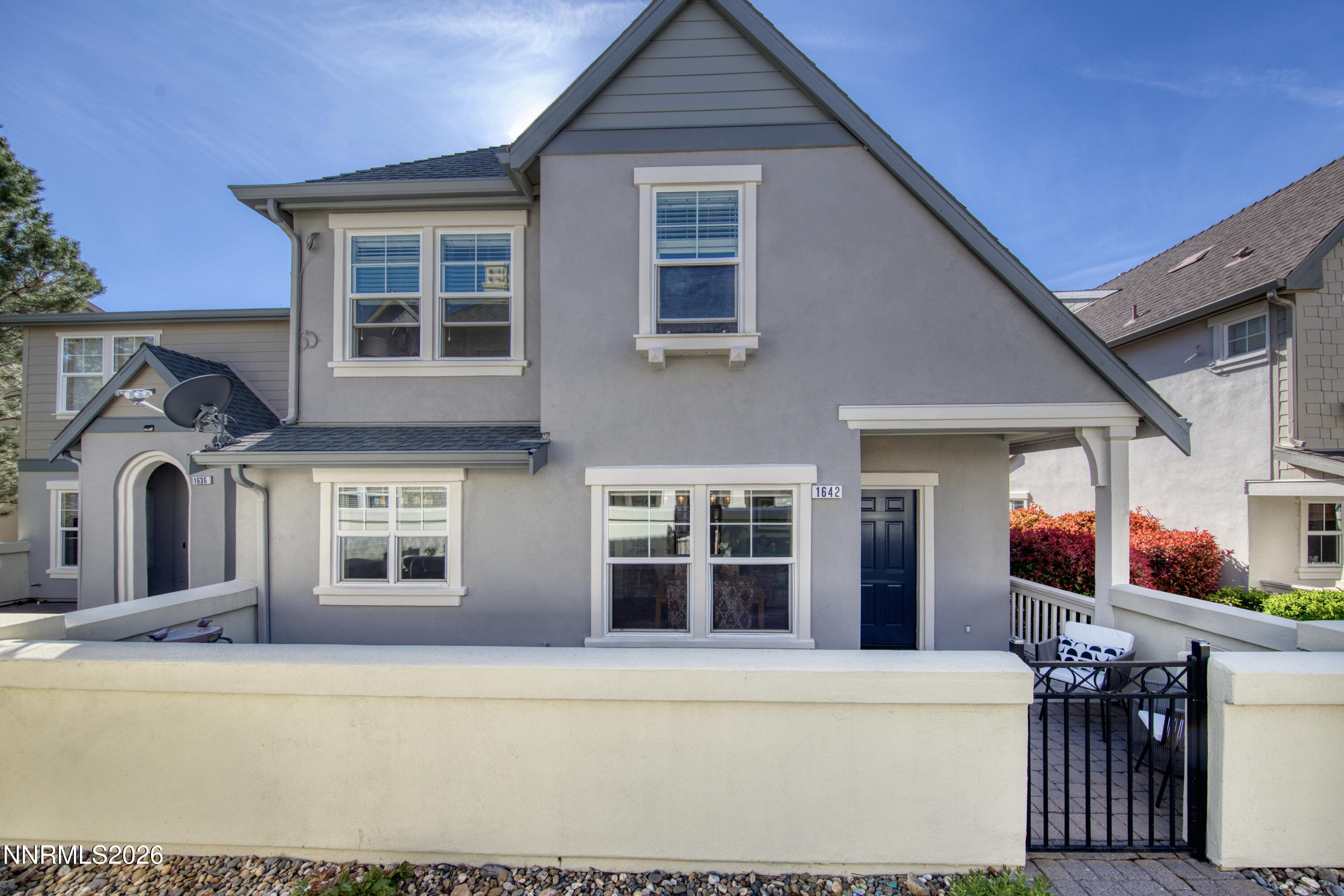 1642 Spring Hill Drive Reno, NV 89523 - Photo 32 of 43 a front view of a house with many windows