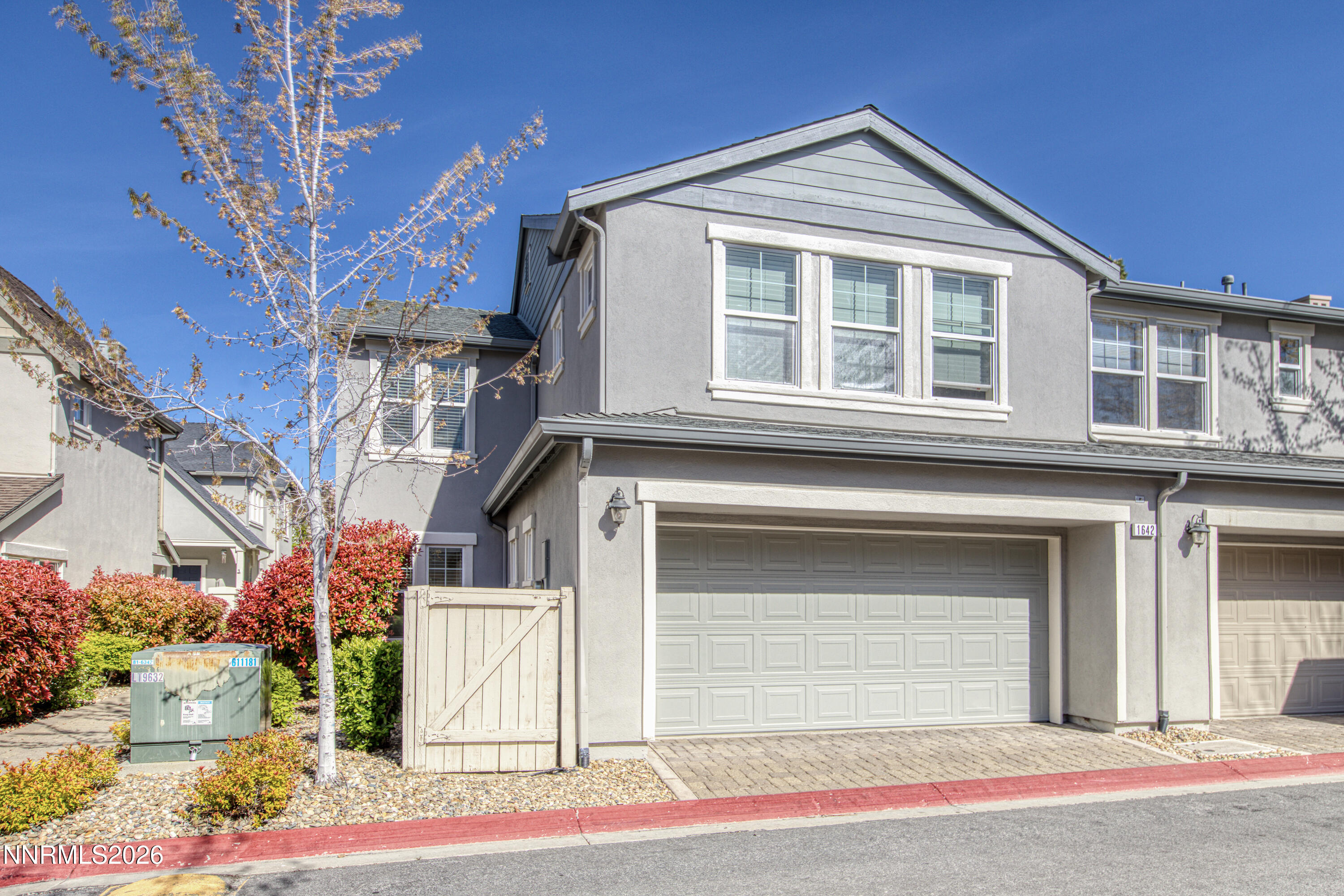 1642 Spring Hill Drive Reno, NV 89523 - Photo 33 of 43 a front view of a house with a yard