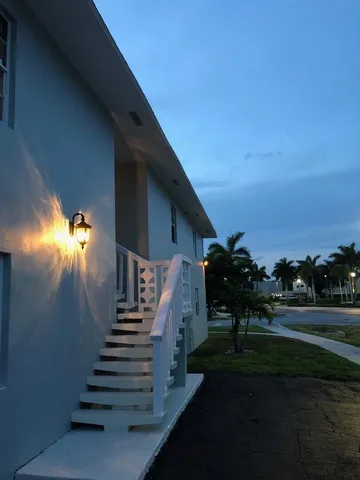 a view of a yard in front of a house