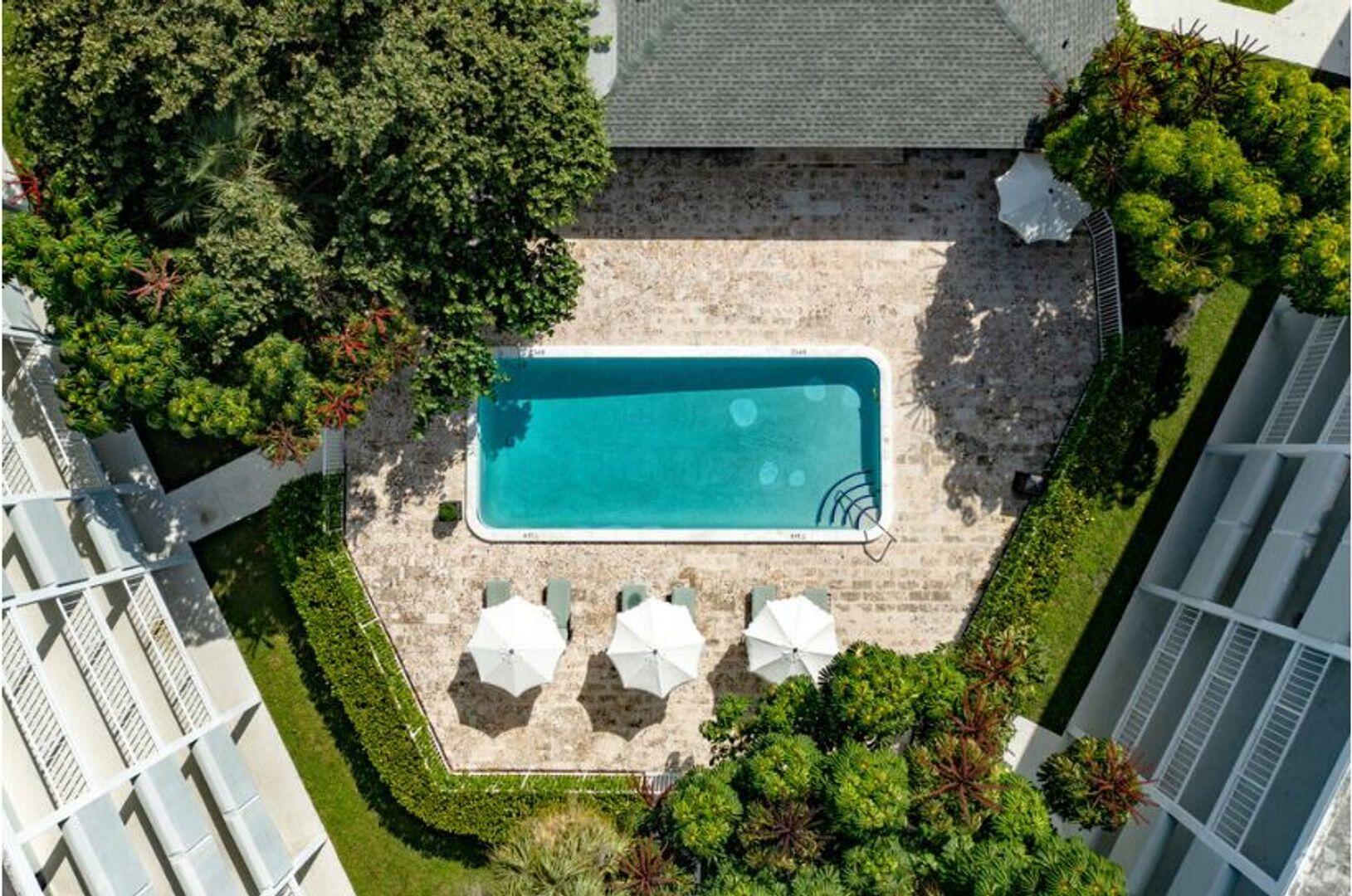 2711 Vandiver Drive, Unit 307 West Palm Beach, FL 33409 - Photo 6 of 15 a view of a small pond