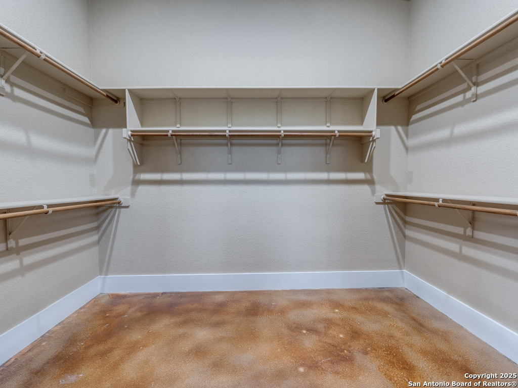 629 Windmill Ranch Road Spring Branch, TX 78070 - Photo 21 of 34 a view of an empty walk in closet