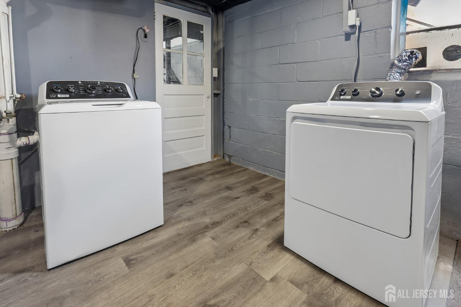 2 Westbury Road Iselin, NJ 08830 - Photo 25 of 25 a utility room with dryer and washer
