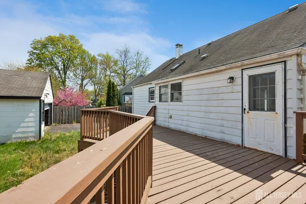 a view of balcony with deck and wooden floor