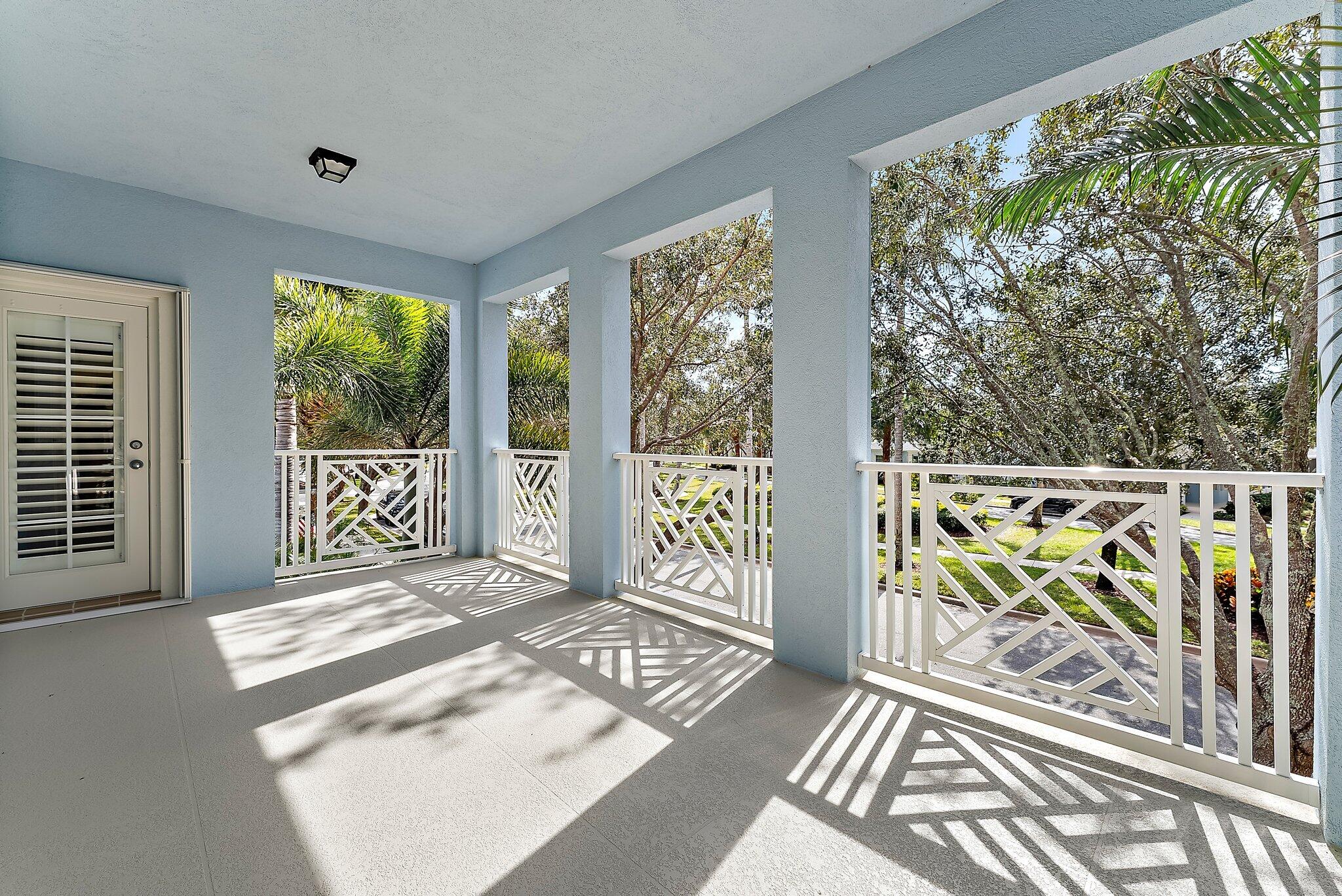 115 Castries Drive Jupiter, FL 33458 - Photo 40 of 60 a view of a porch and wooden floor