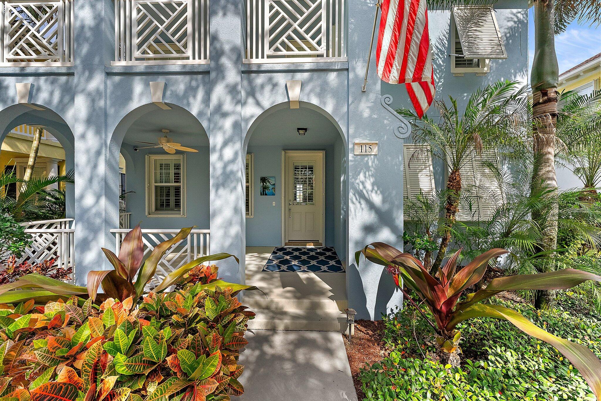 115 Castries Drive Jupiter, FL 33458 - Photo 4 of 60 a front view of a house