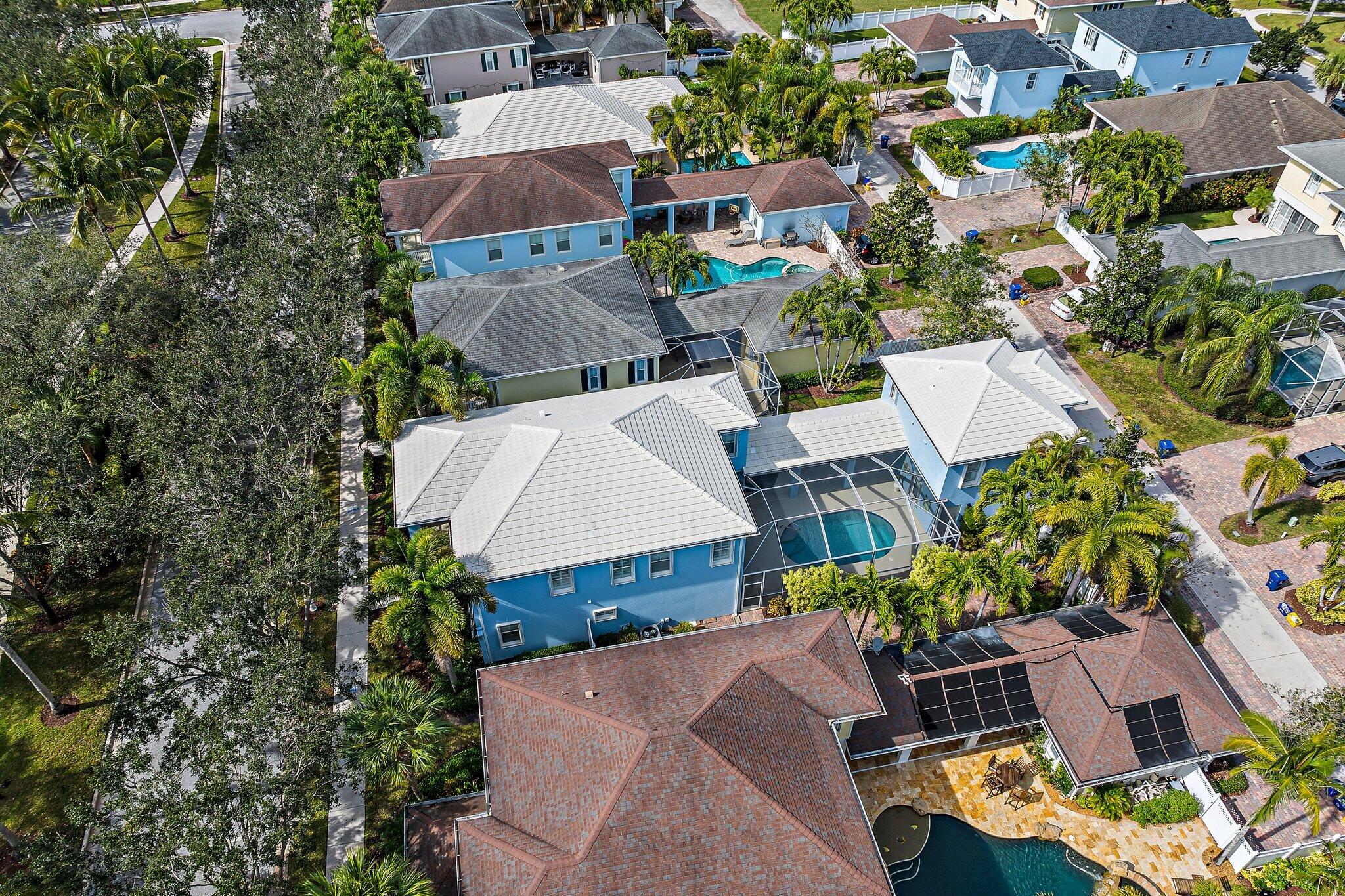 115 Castries Drive Jupiter, FL 33458 - Photo 50 of 60 an aerial view of a house with a garden and plants