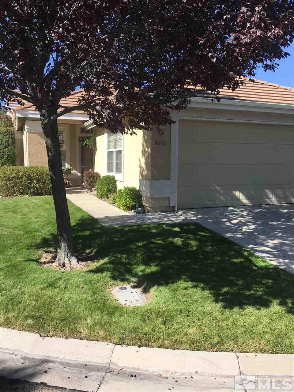 9663 Truckee Meadows Place Reno, NV 89521 - Photo 1 of 1 a backyard of a house with lots of green space