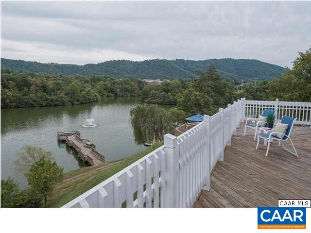 200 Lake Club Court, Unit 3 Charlottesville, VA 22902 - Photo 1 of 16 a view of a terrace with a lake