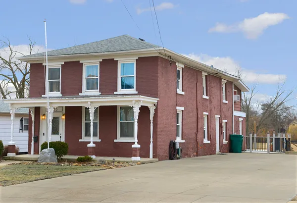 a front view of a building with street