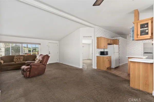 a living room with furniture and a couch