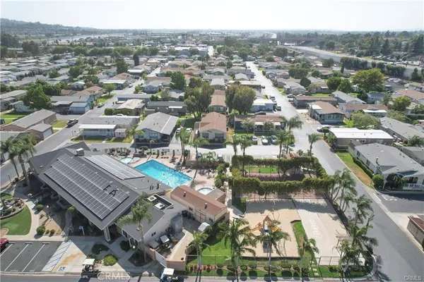 an aerial view of a city with lots of residential buildings