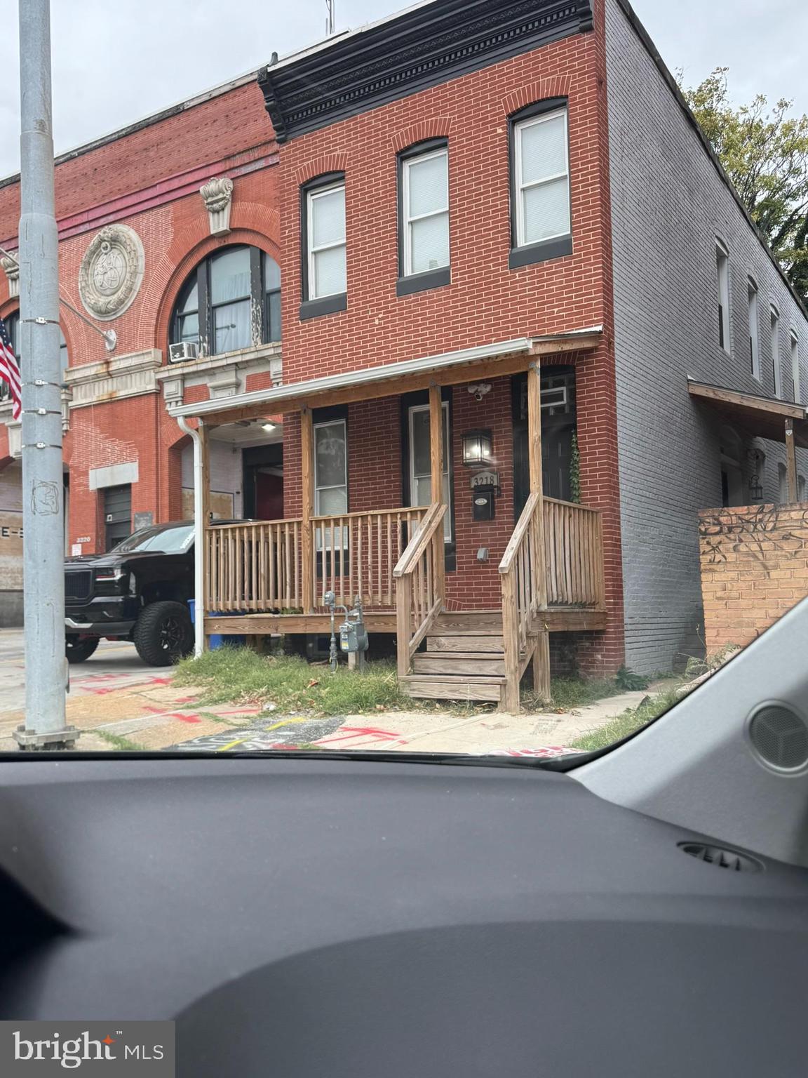 a front view of a house with a porch