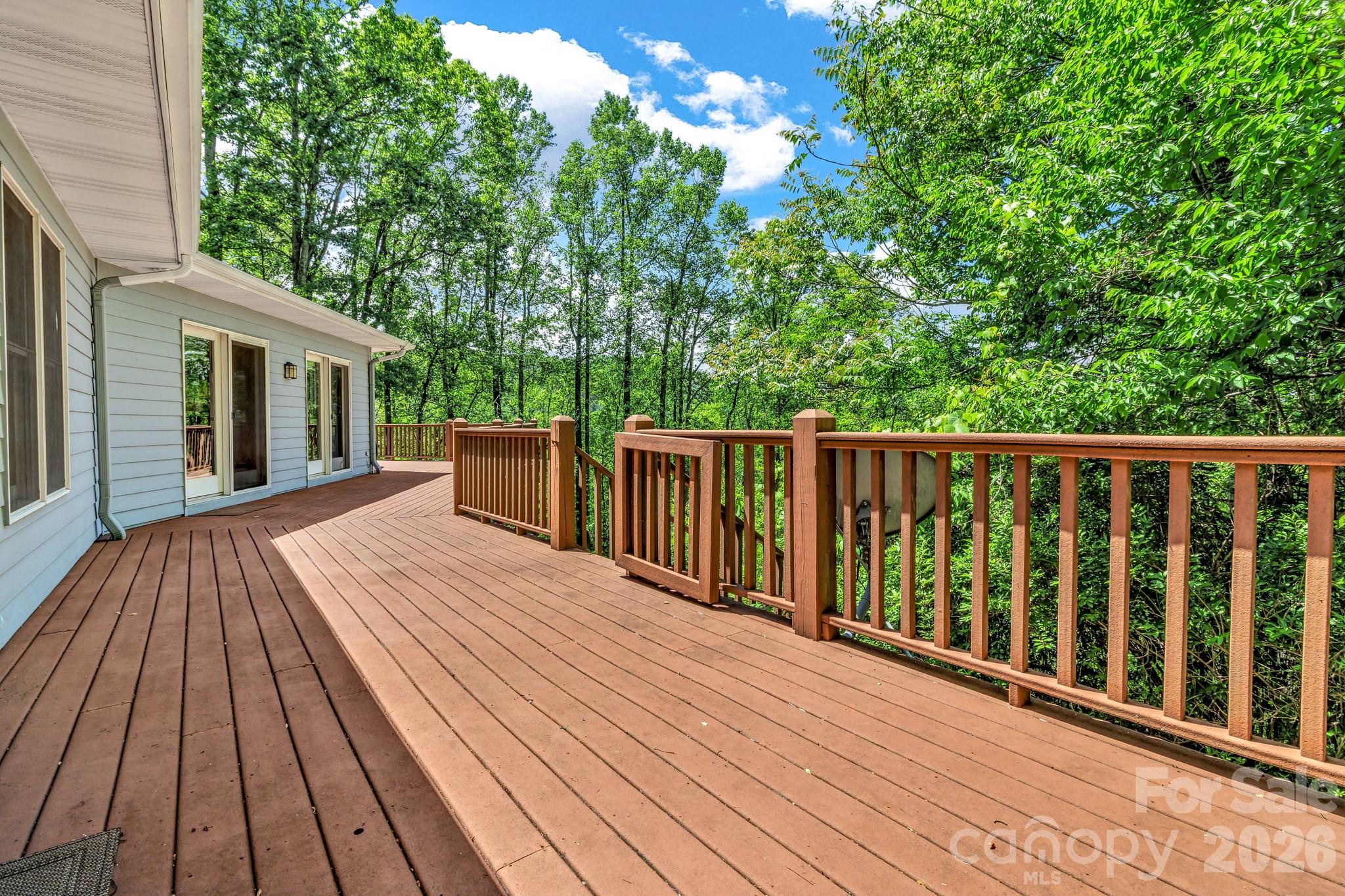 125 Winding Ridge Road Asheville, NC 28803 - Photo 19 of 48 a view of backyard with deck and wooden floor