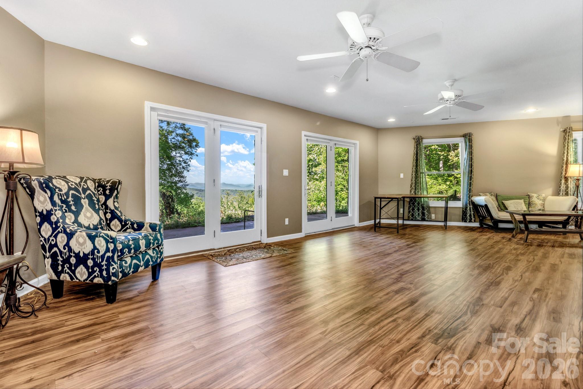 125 Winding Ridge Road Asheville, NC 28803 - Photo 33 of 48 a view of a livingroom with furniture window and wooden floor