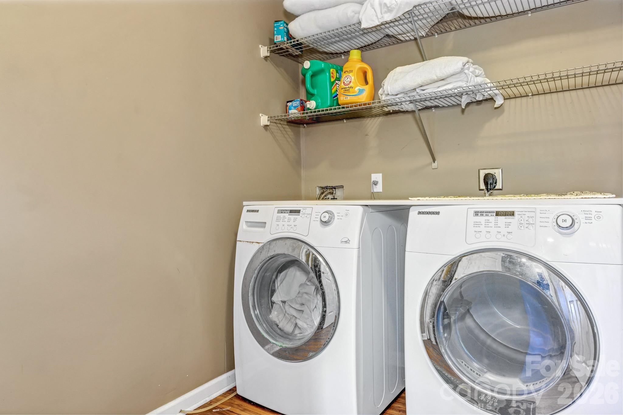 125 Winding Ridge Road Asheville, NC 28803 - Photo 36 of 48 a utility room with dryer and washer