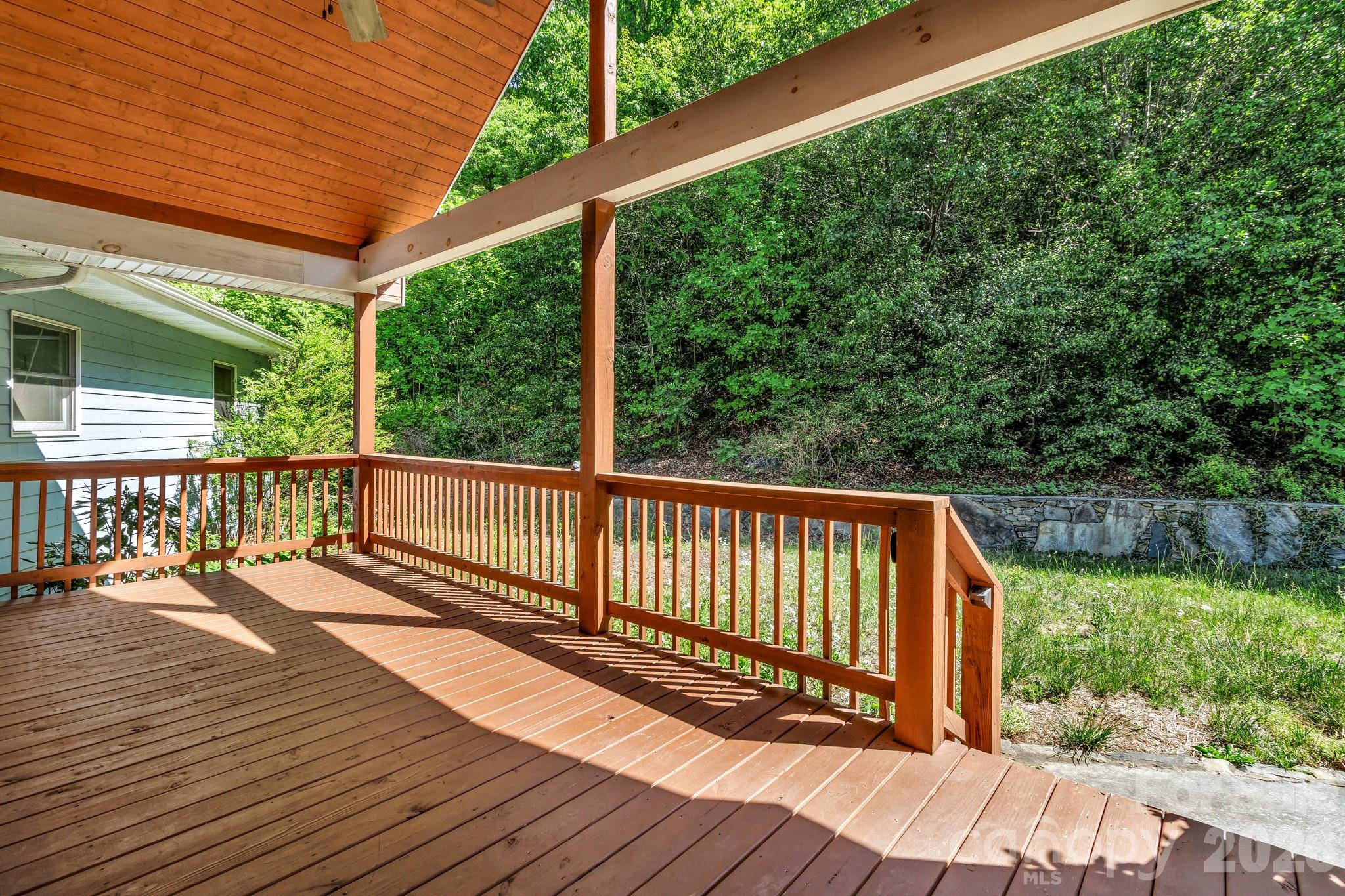 125 Winding Ridge Road Asheville, NC 28803 - Photo 4 of 48 a view of balcony with wooden floor