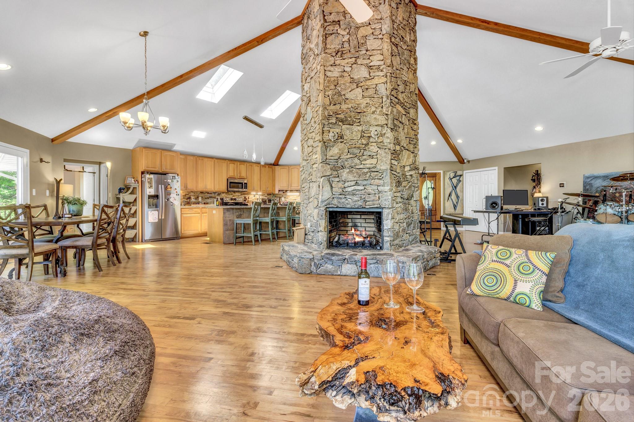 125 Winding Ridge Road Asheville, NC 28803 - Photo 8 of 48 a living room with furniture and a fireplace