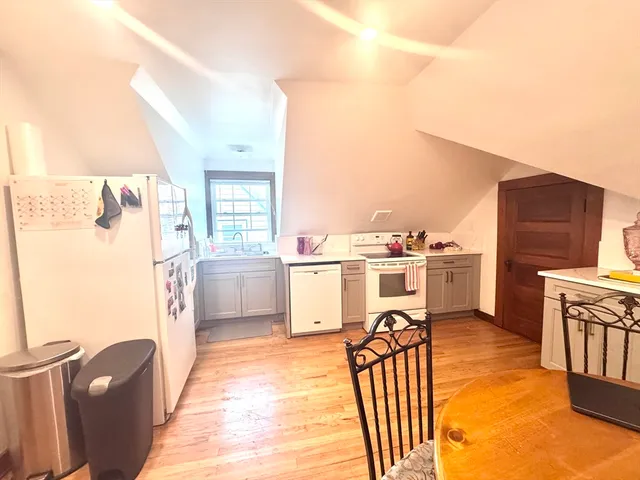 a view of a kitchen with a sink