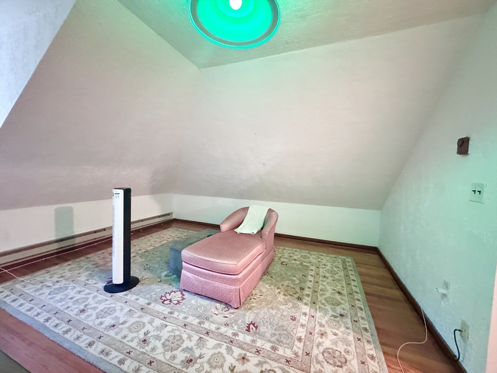 22 Greenough Street, Unit 3 Brookline, MA 02445 - Photo 6 of 14 a bathroom with a sink and a mirror