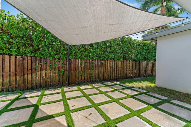 a view of outdoor space with wooden fence