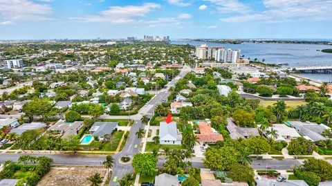 an aerial view of residential building and lake