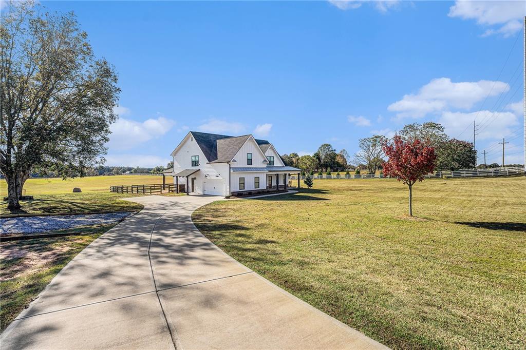 1550 Knox Chapel Road Social Circle, GA 30025 - Photo 35 of 35 a view of a swimming pool with an ocean view