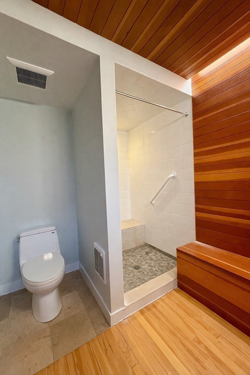 174 Maplewood Street, Unit 174 Watertown, MA 02472 - Photo 22 of 30 a view of bathroom and wooden floor