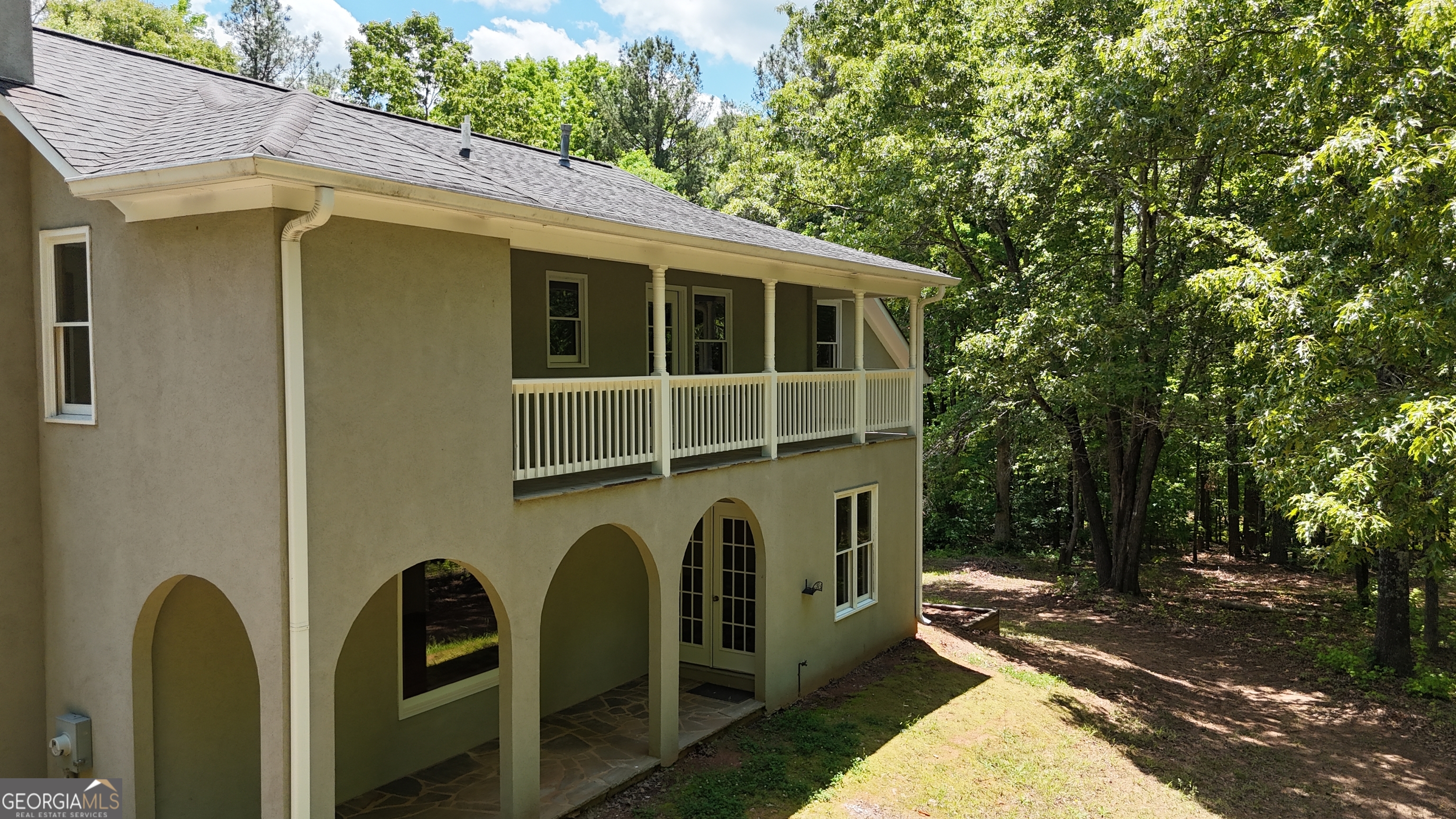 1933 Highway 101 Dallas, GA 30157 - Photo 31 of 40 Great view of the rear of home highlighting both main level covered terrace and second floor balcony
