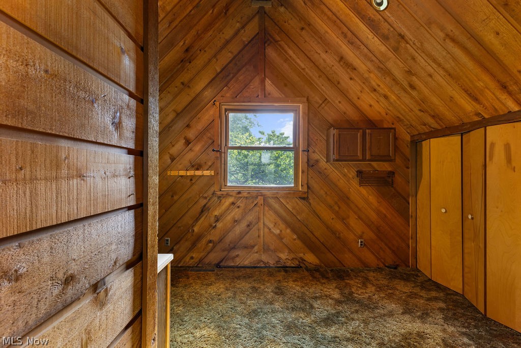 7734 Seasons Road Kent, OH 44240 - Photo 28 of 50 Master Bathroom with Tile Shower, Large Dressing Area Walk-in Closet, 09x14 with a Sink
