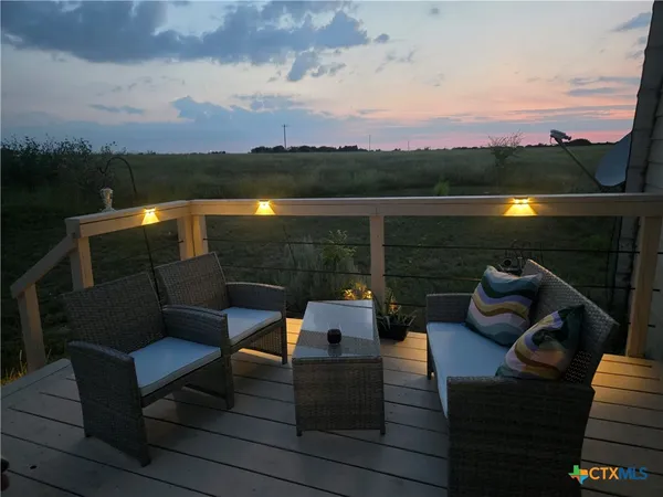 a view of a terrace with couches