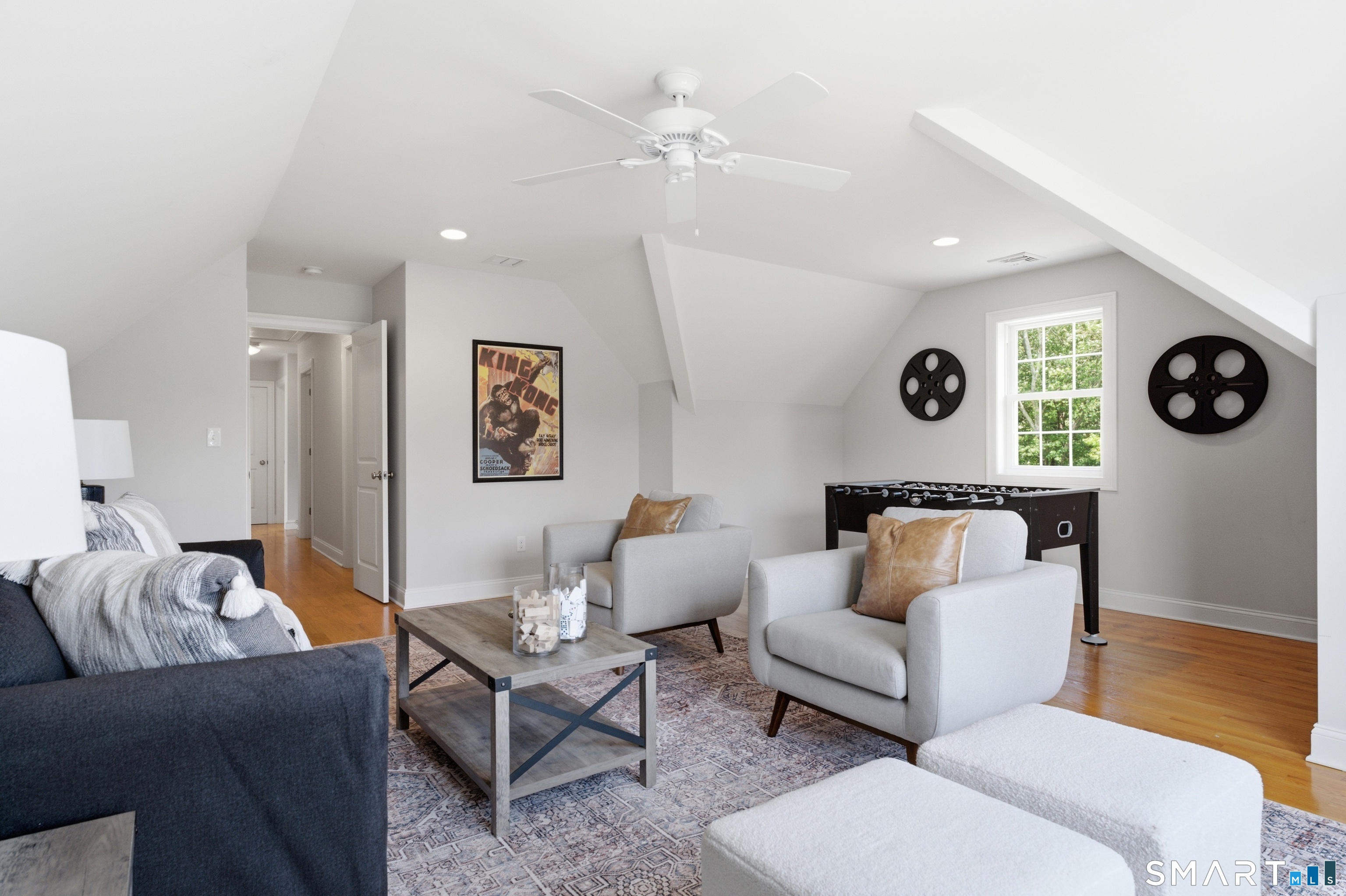 838 Little Meadow Road Guilford, CT 06437 - Photo 23 of 40 The bonus room is bright and spacious with plenty of windows and more hardwood flooring