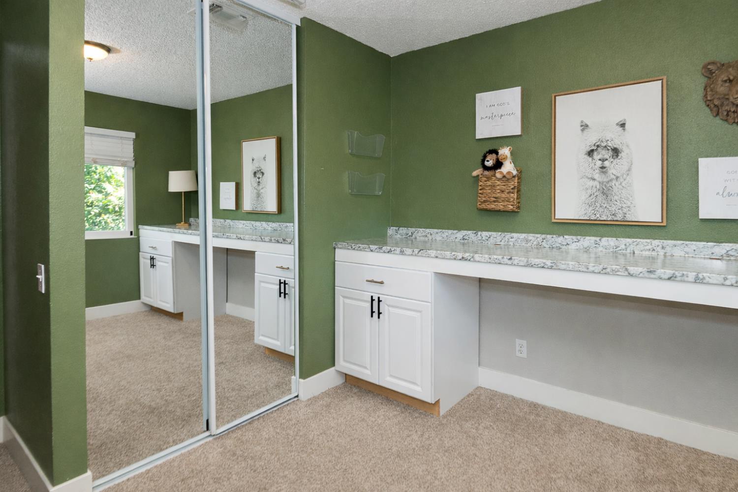 2672 Rio Bravo Circle Sacramento, CA 95826 - Photo 16 of 26 a spacious bathroom with a granite countertop sink and a mirror