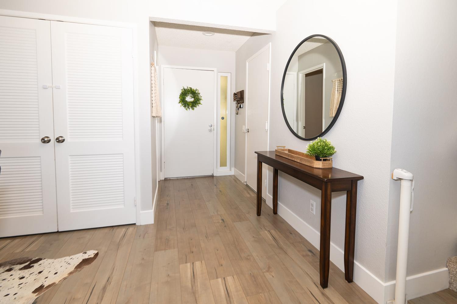 2672 Rio Bravo Circle Sacramento, CA 95826 - Photo 3 of 26 a living room with furniture and a wooden floor