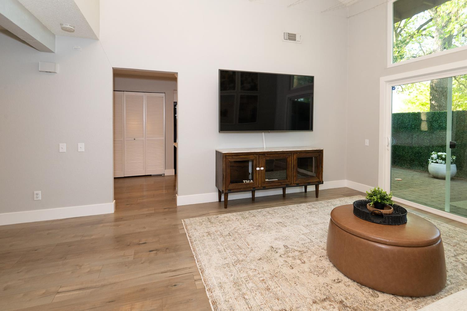 2672 Rio Bravo Circle Sacramento, CA 95826 - Photo 4 of 26 a living room with furniture and a flat screen tv