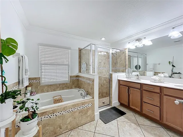 a bathroom with a sink double vanity and a mirror
