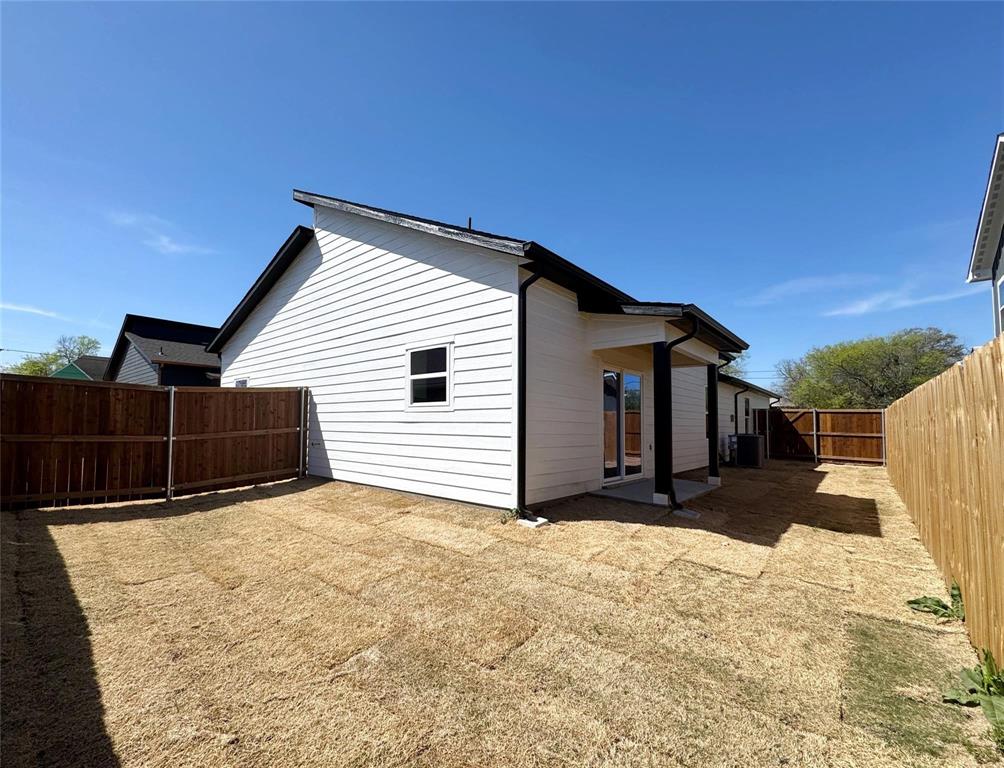 2025 Stuart Street, Unit A Greenville, TX 75401 - Photo 2 of 11 a view of a house with a yard