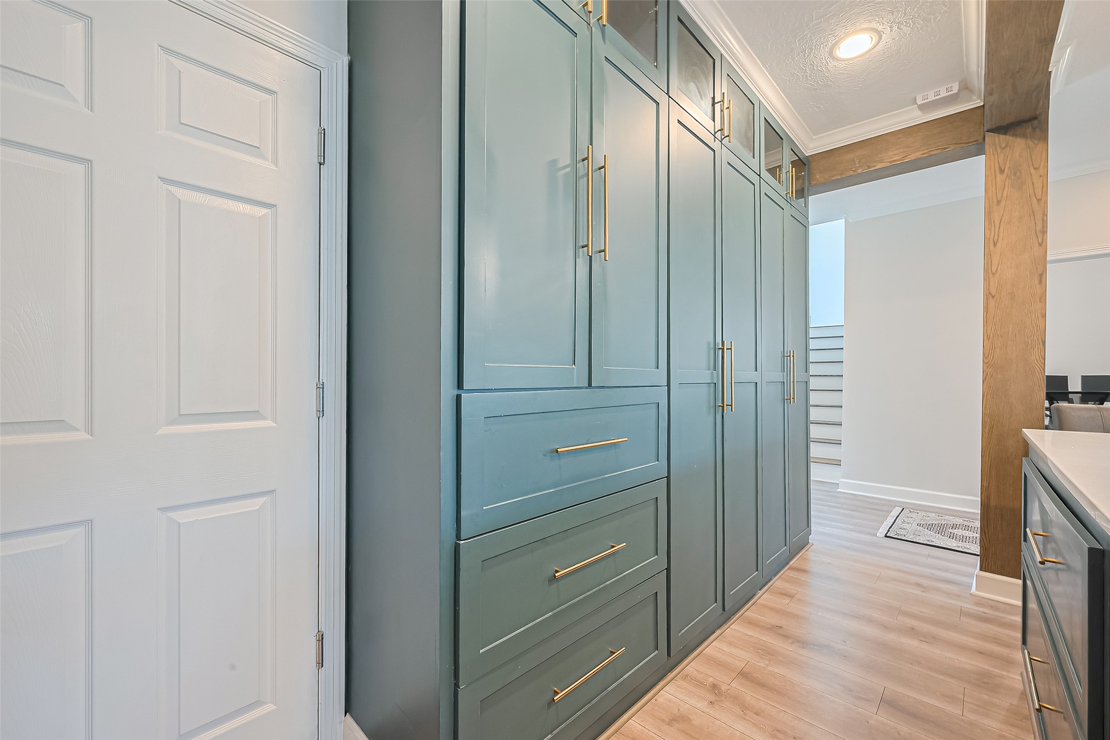 1413 Whispering Pines Drive, Unit 5 Houston, TX 77055 - Photo 14 of 47 a view of a hallway with wooden floor