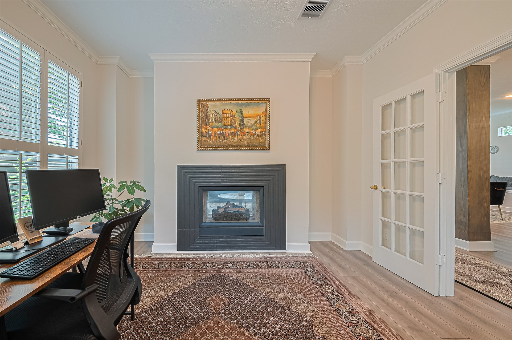 1413 Whispering Pines Drive, Unit 5 Houston, TX 77055 - Photo 19 of 47 a view of a livingroom with workspace and a window