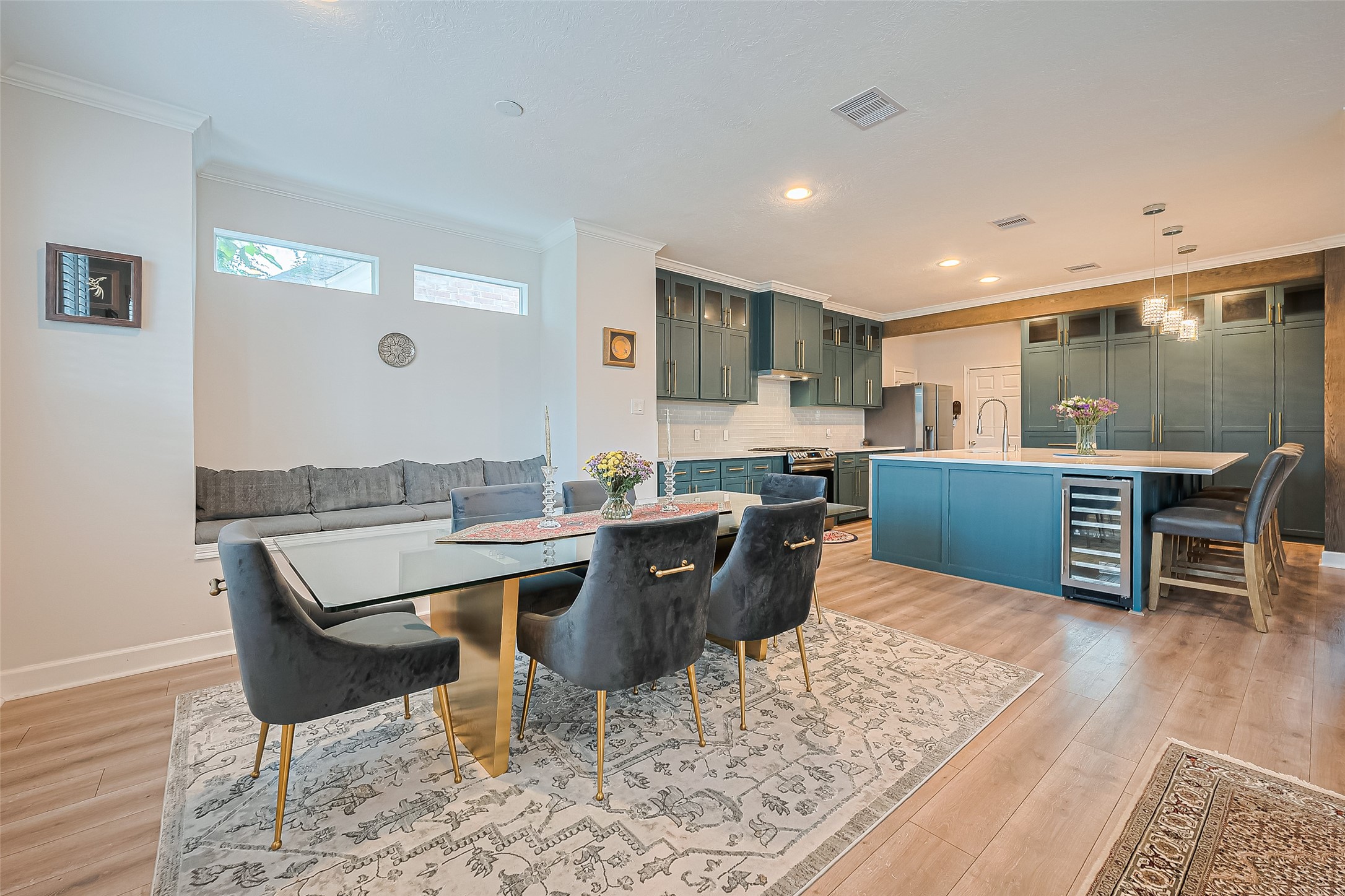 1413 Whispering Pines Drive, Unit 5 Houston, TX 77055 - Photo 20 of 47 a view of a dining room with furniture