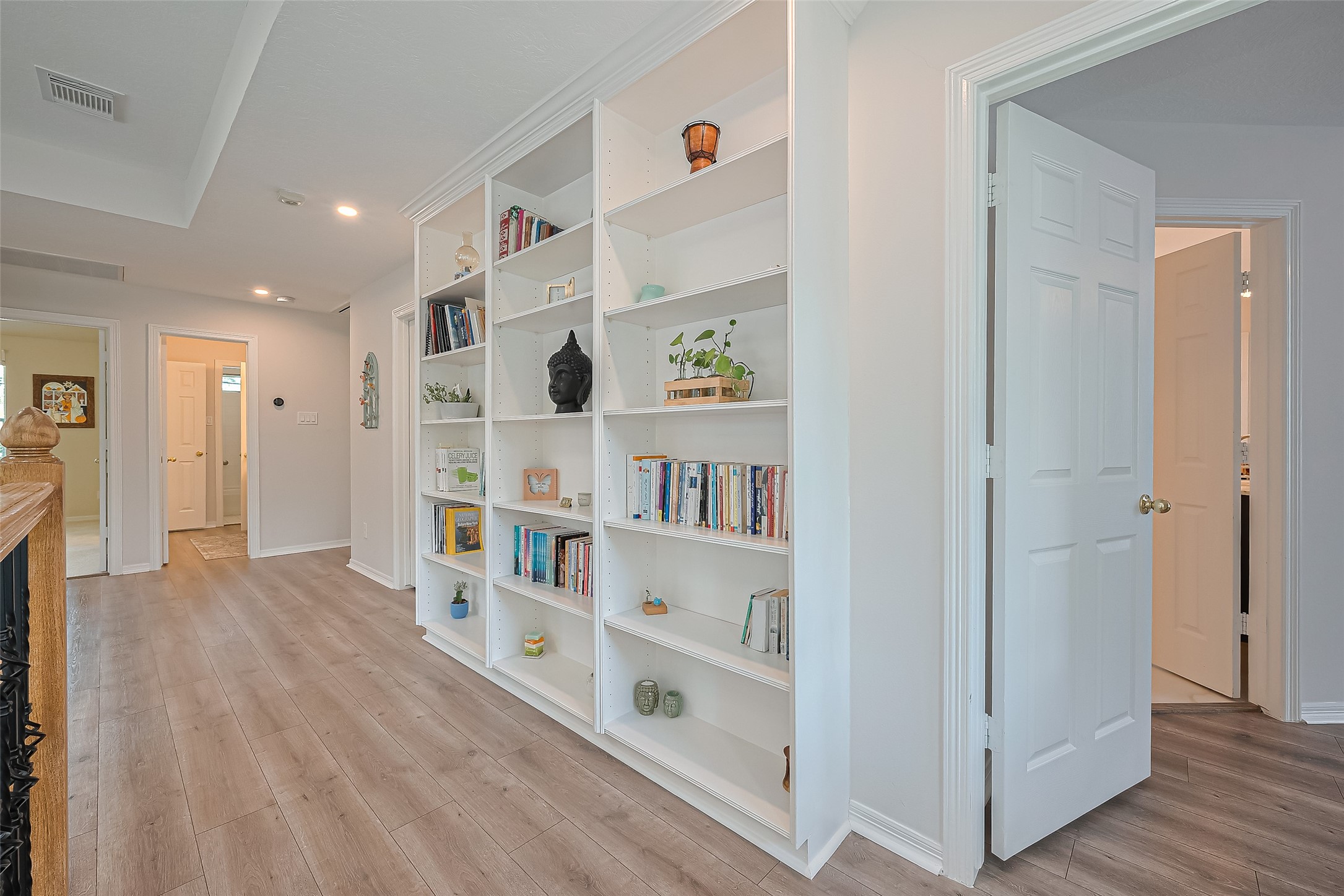 1413 Whispering Pines Drive, Unit 5 Houston, TX 77055 - Photo 26 of 47 a view of livingroom with furniture and wooden floor