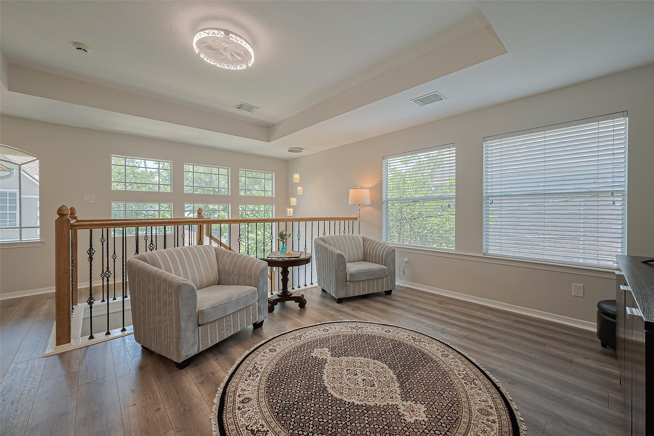 1413 Whispering Pines Drive, Unit 5 Houston, TX 77055 - Photo 28 of 47 a living room with furniture and a large window