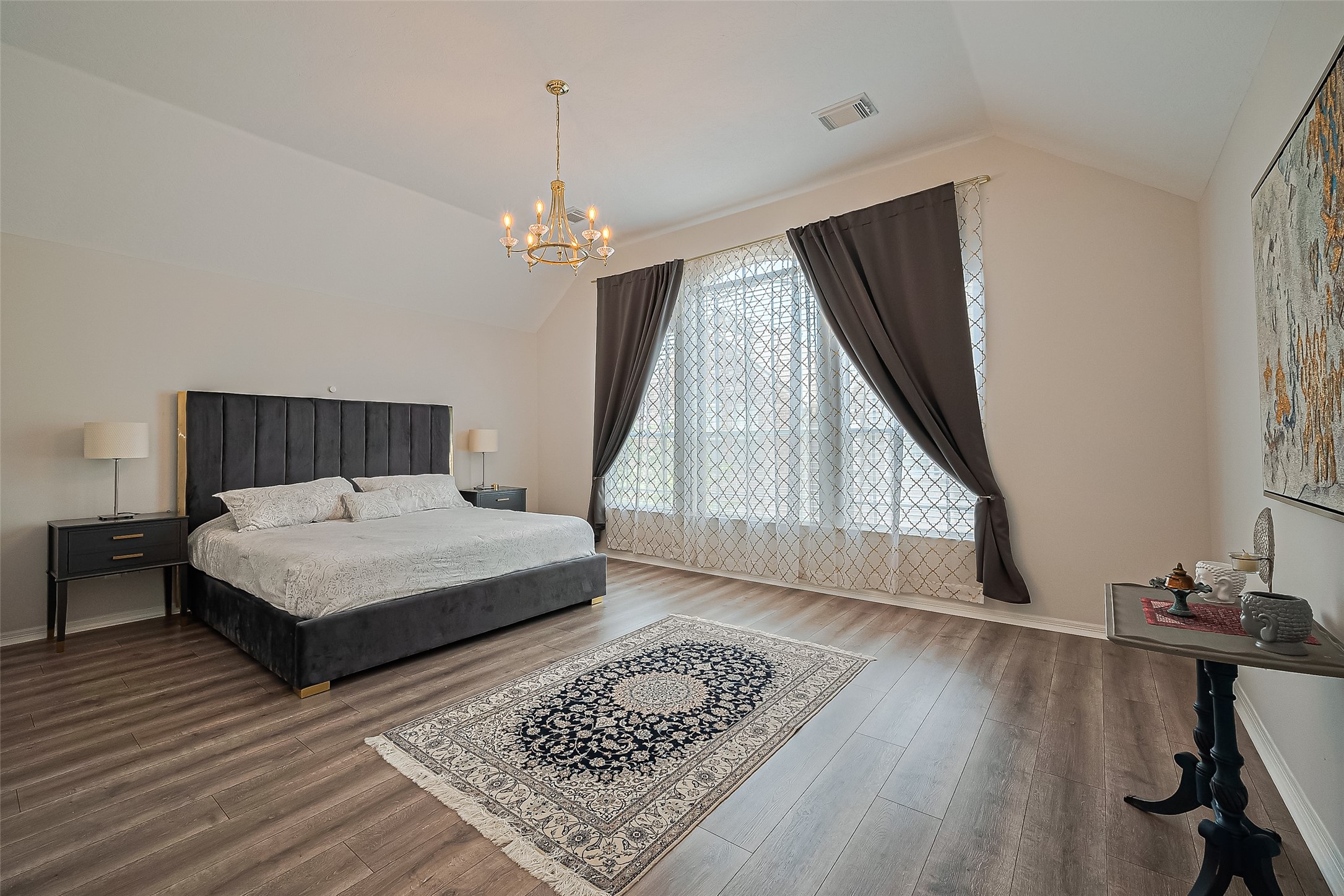 1413 Whispering Pines Drive, Unit 5 Houston, TX 77055 - Photo 30 of 47 a bedroom with a bed and a window