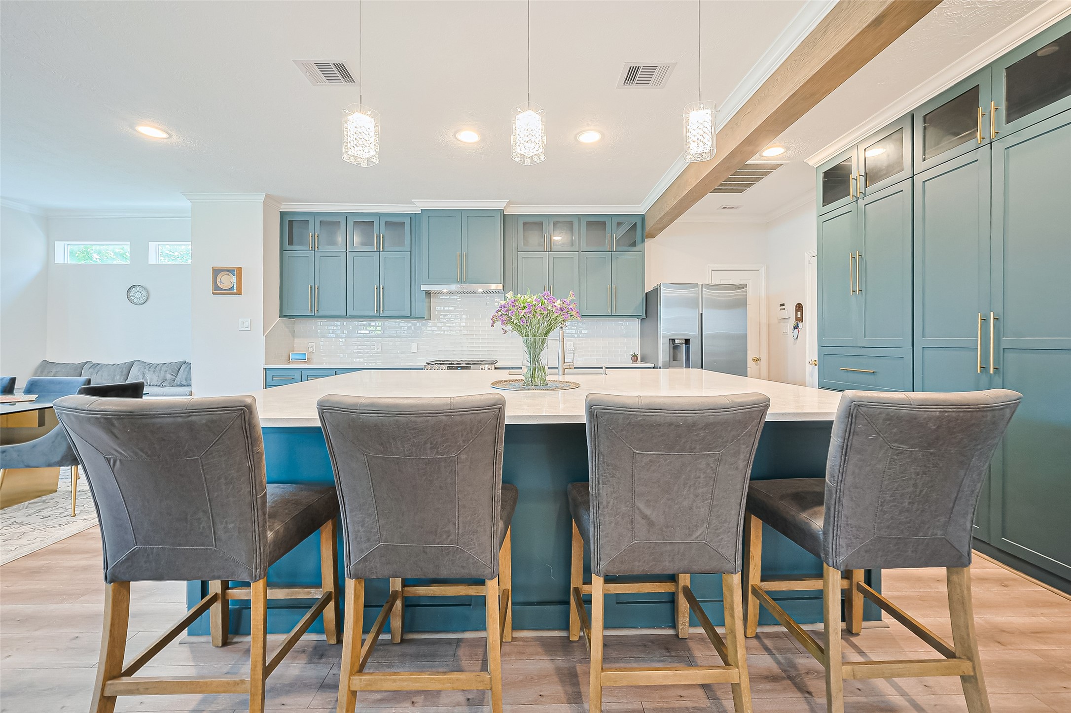 1413 Whispering Pines Drive, Unit 5 Houston, TX 77055 - Photo 3 of 47 a dining room with furniture and wooden floor