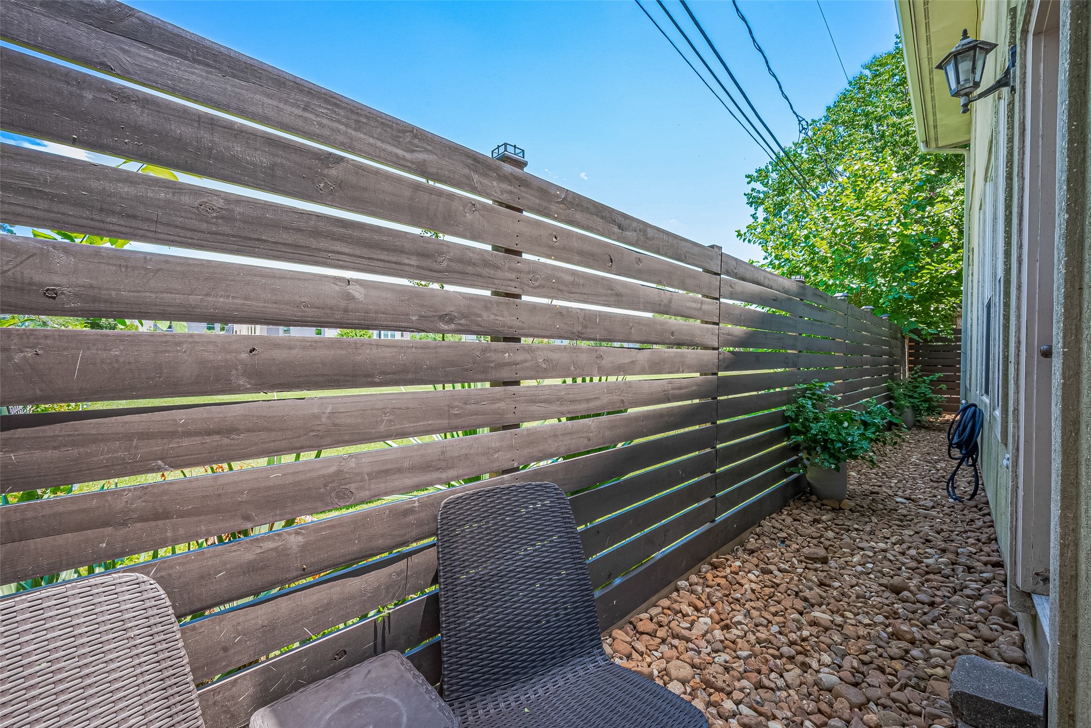 1413 Whispering Pines Drive, Unit 5 Houston, TX 77055 - Photo 45 of 47 a view of backyard with wooden stairs
